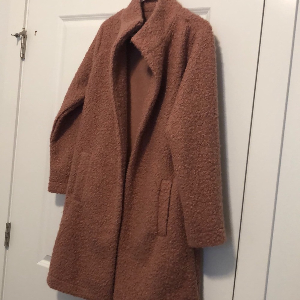 A cozy, but chic jacket. Dark rose color. Beautiful back detail. Pockets!